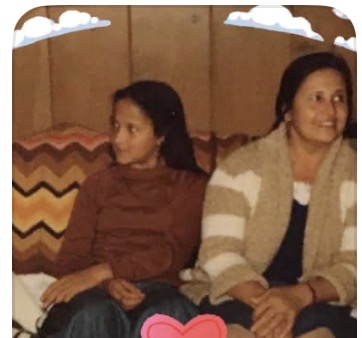 Martina as a teenager, seated beside her mother, shortly after arriving in the United States